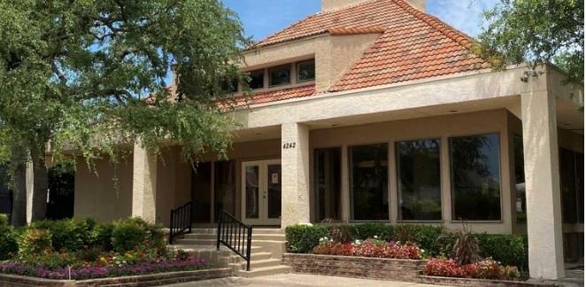 4345 Timberglen Road Dallas, TX 75287 - Photo 23 of 26 front view of a house with a potted plant