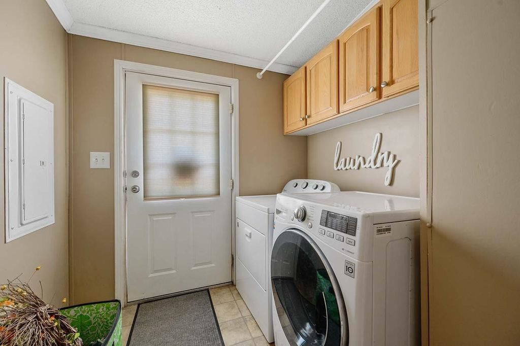 1664 Woodsdale Road Roxboro, NC 27574 - Photo 35 of 50 a utility room with dryer and washer