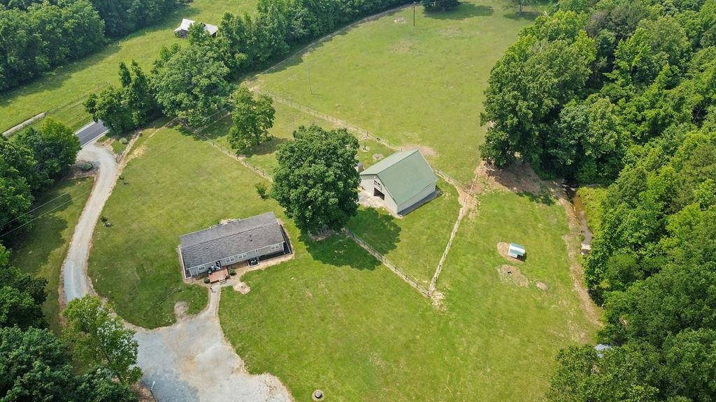 1664 Woodsdale Road Roxboro, NC 27574 - Photo 46 of 50 an aerial view of a residential houses with yard