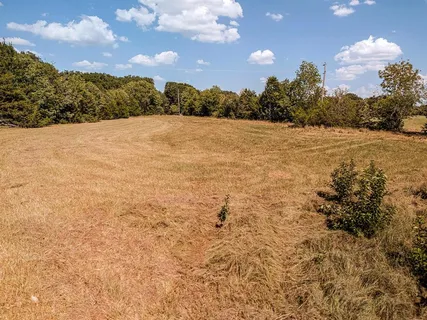 a view of mountain with sunset