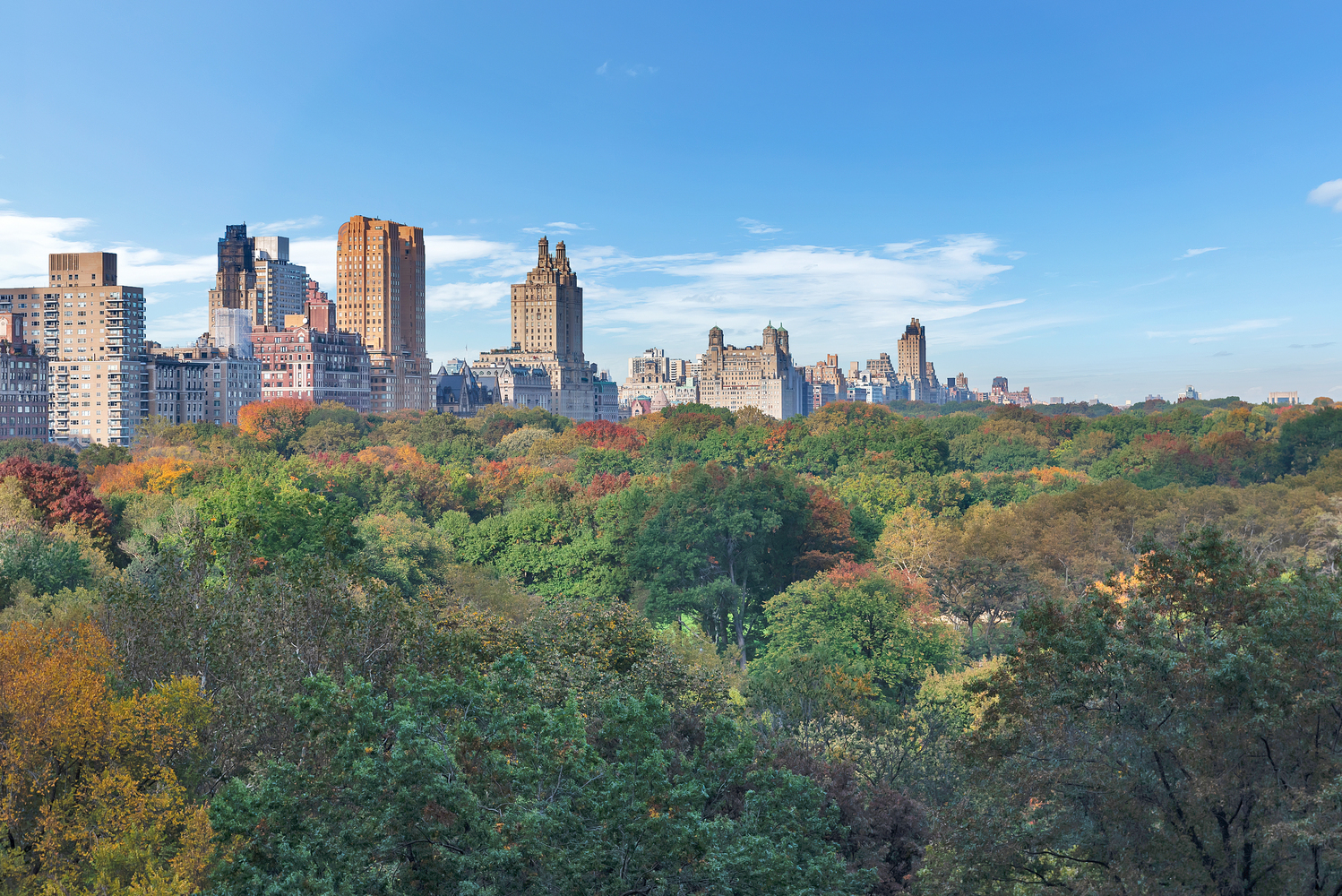 160 Central Park South, Unit 1015/1018 Manhattan, NY 10019 - Photo 14 of 15 a view of a city with tall buildings and a lake view