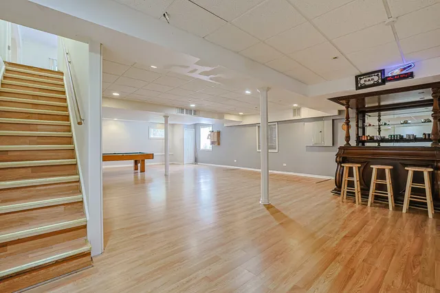 a view of kitchen and dining room with wooden floor