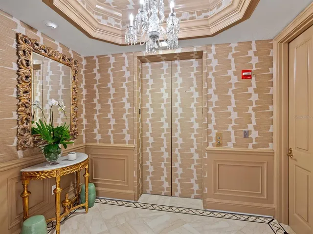 a outdoor living space with furniture and a flat screen tv