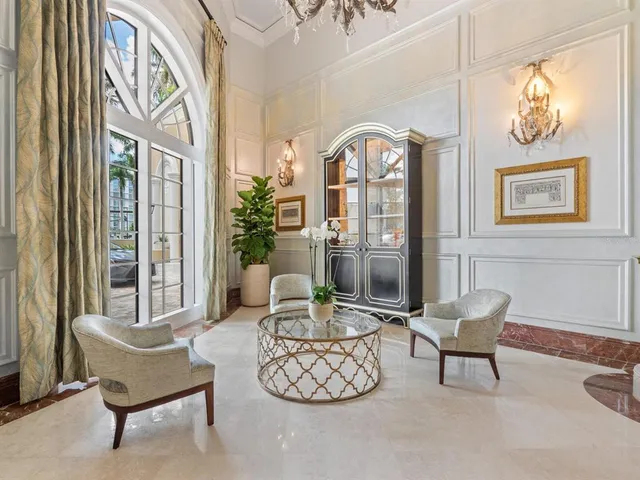 a swimming pool with outdoor seating and yard