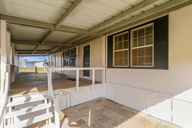 a view of a house with a large window