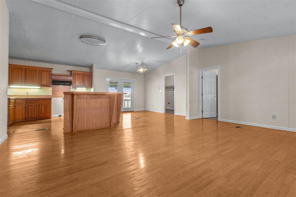 4000 Dee Drive Terrell, TX 75160 - Photo 5 of 21 a view of a kitchen with a microwave and a stove