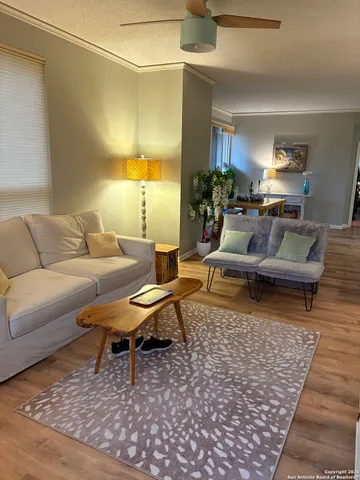 a living room with furniture and a rug