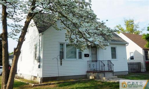 406 Fulton Street Middlesex, NJ 08846 - Photo 1 of 19 a view of a house with a yard