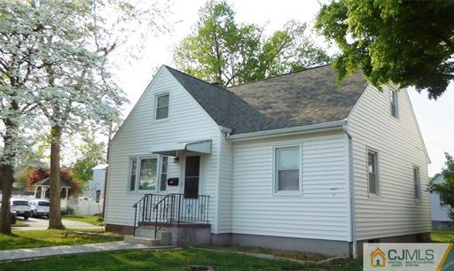 406 Fulton Street Middlesex, NJ 08846 - Photo 16 of 19 a view of a house with a yard