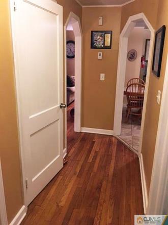 406 Fulton Street Middlesex, NJ 08846 - Photo 8 of 19 wooden floor in an empty room