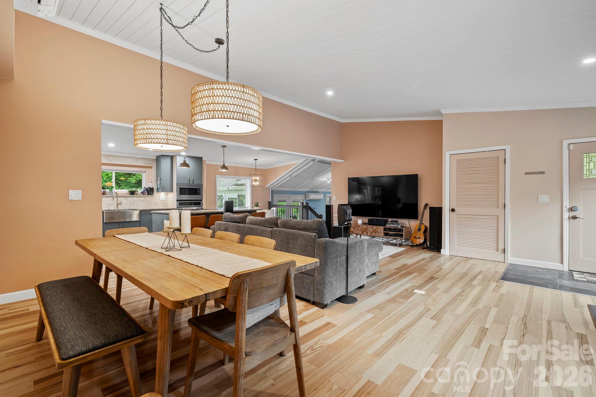 419 East Blue Ridge Road East Flat Rock, NC 28726 - Photo 16 of 44 a view of a dining room with furniture
