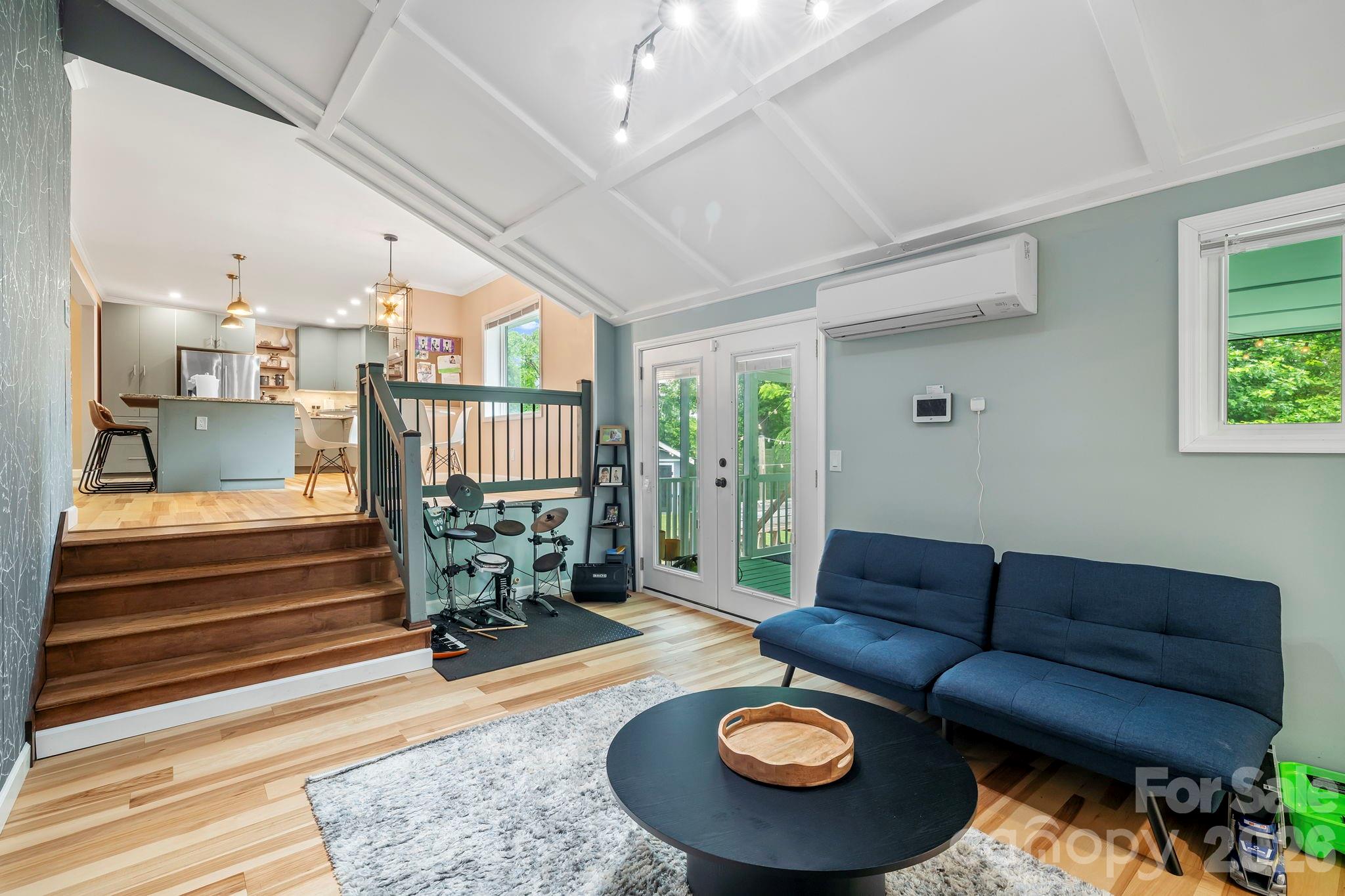 419 East Blue Ridge Road East Flat Rock, NC 28726 - Photo 22 of 44 a living room with furniture and a rug