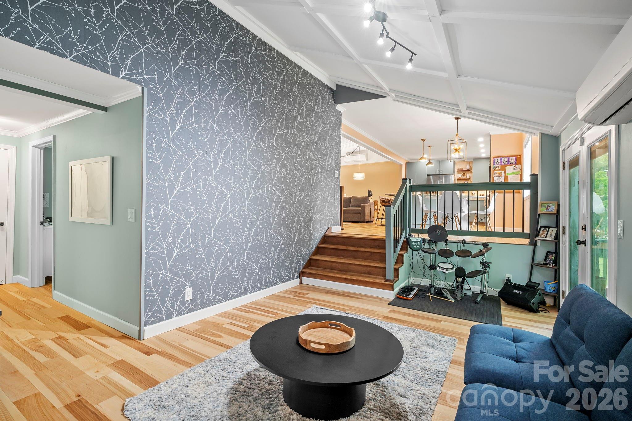 419 East Blue Ridge Road East Flat Rock, NC 28726 - Photo 23 of 44 a view of a livingroom with furniture and hardwood floor