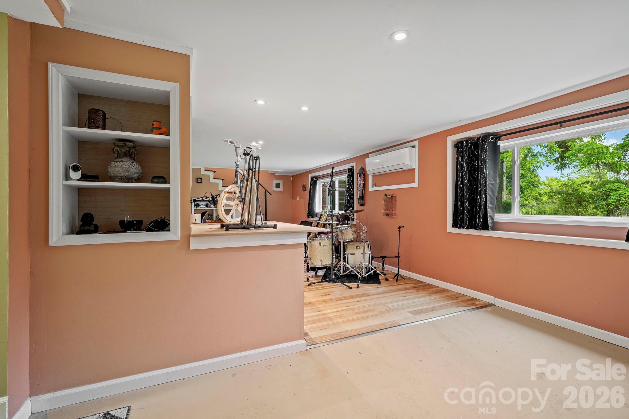 419 East Blue Ridge Road East Flat Rock, NC 28726 - Photo 31 of 44 a view of a living room with a large window