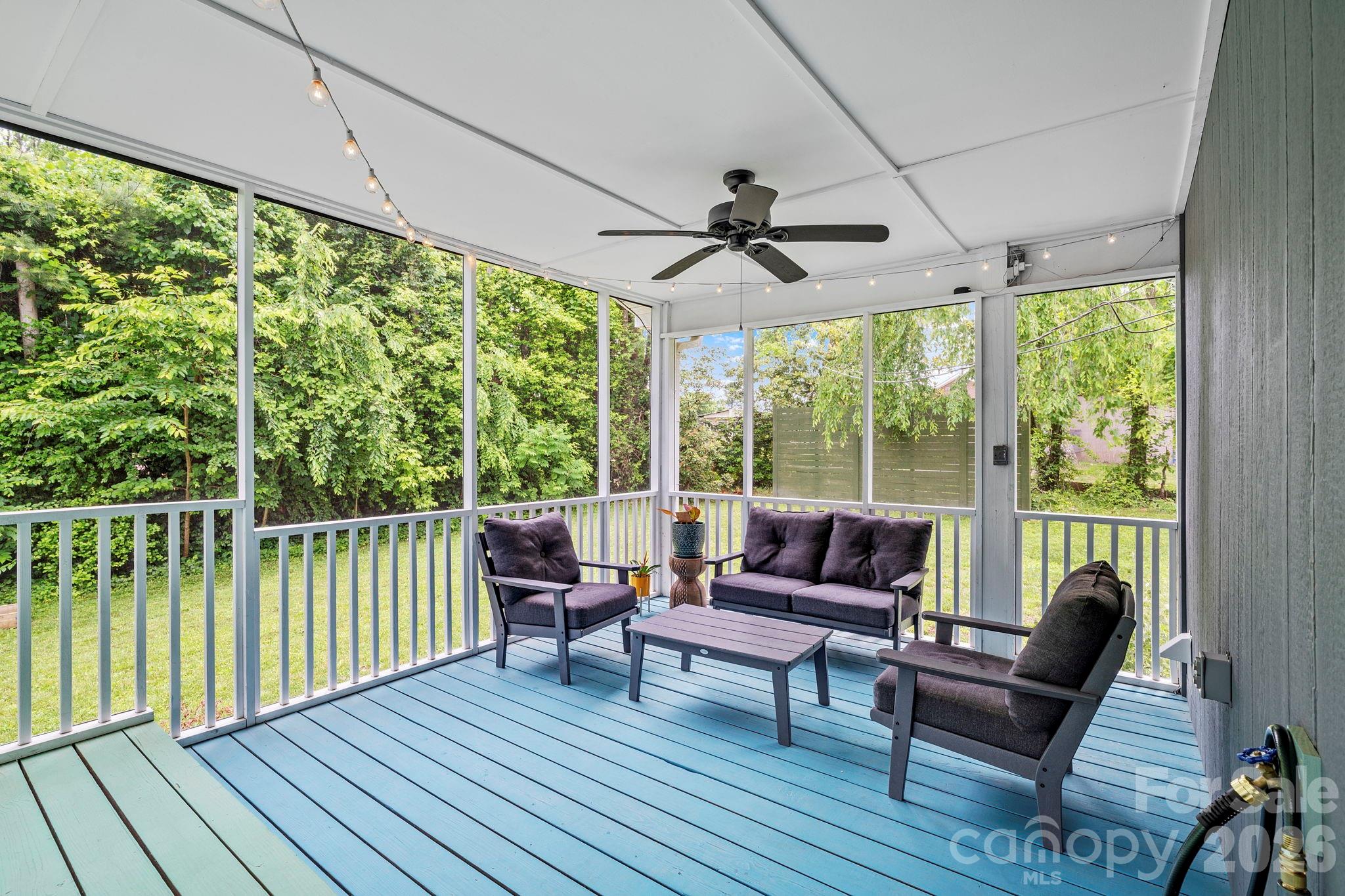 419 East Blue Ridge Road East Flat Rock, NC 28726 - Photo 36 of 44 a living room with furniture and a large window