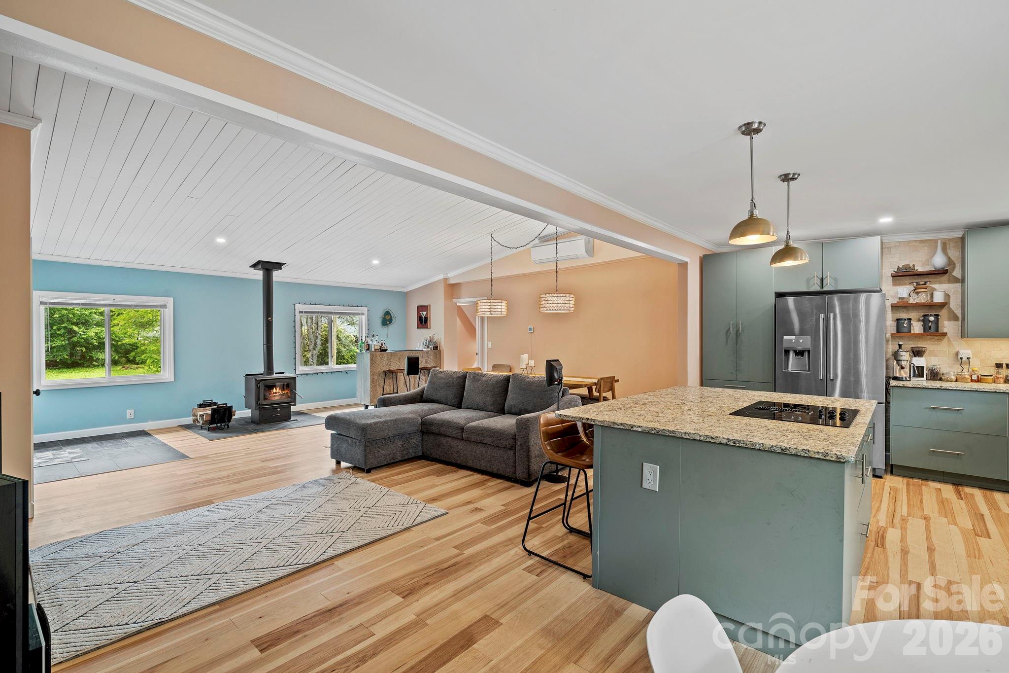 419 East Blue Ridge Road East Flat Rock, NC 28726 - Photo 6 of 44 a living room with furniture and a large window
