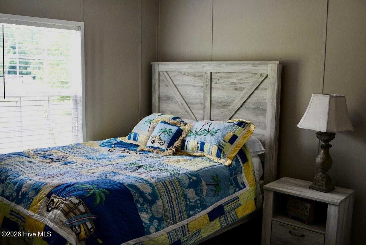 1430 Nixonton Road Elizabeth City, NC 27909 - Photo 25 of 30 Bedroom #2 is roomy enough to hold a double bed or even queen bed. There is a small closet in the room.