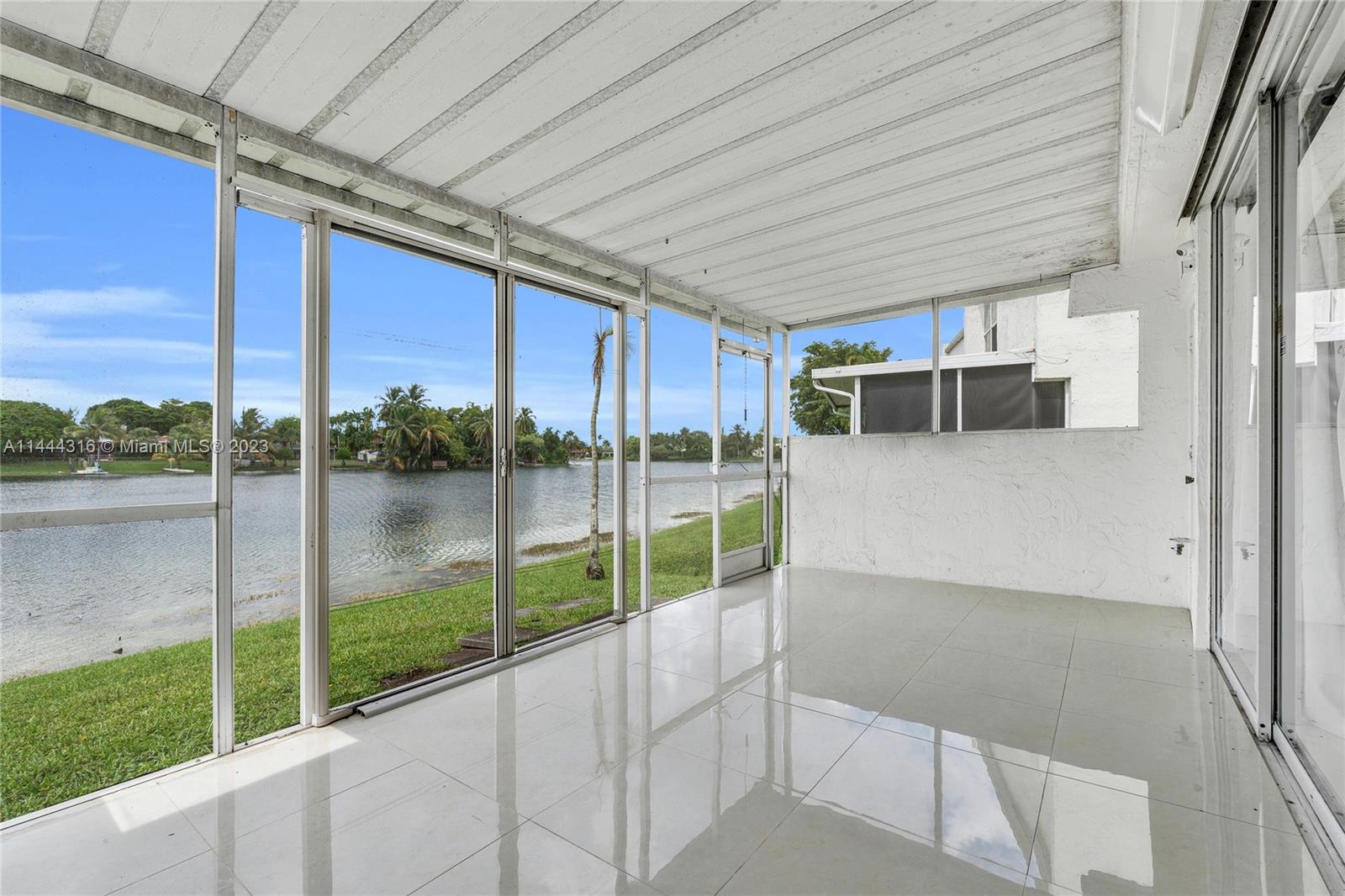 14001 Southwest 84th Street, Unit 1308 Miami, FL 33183 - Photo 31 of 47 a view of a porch