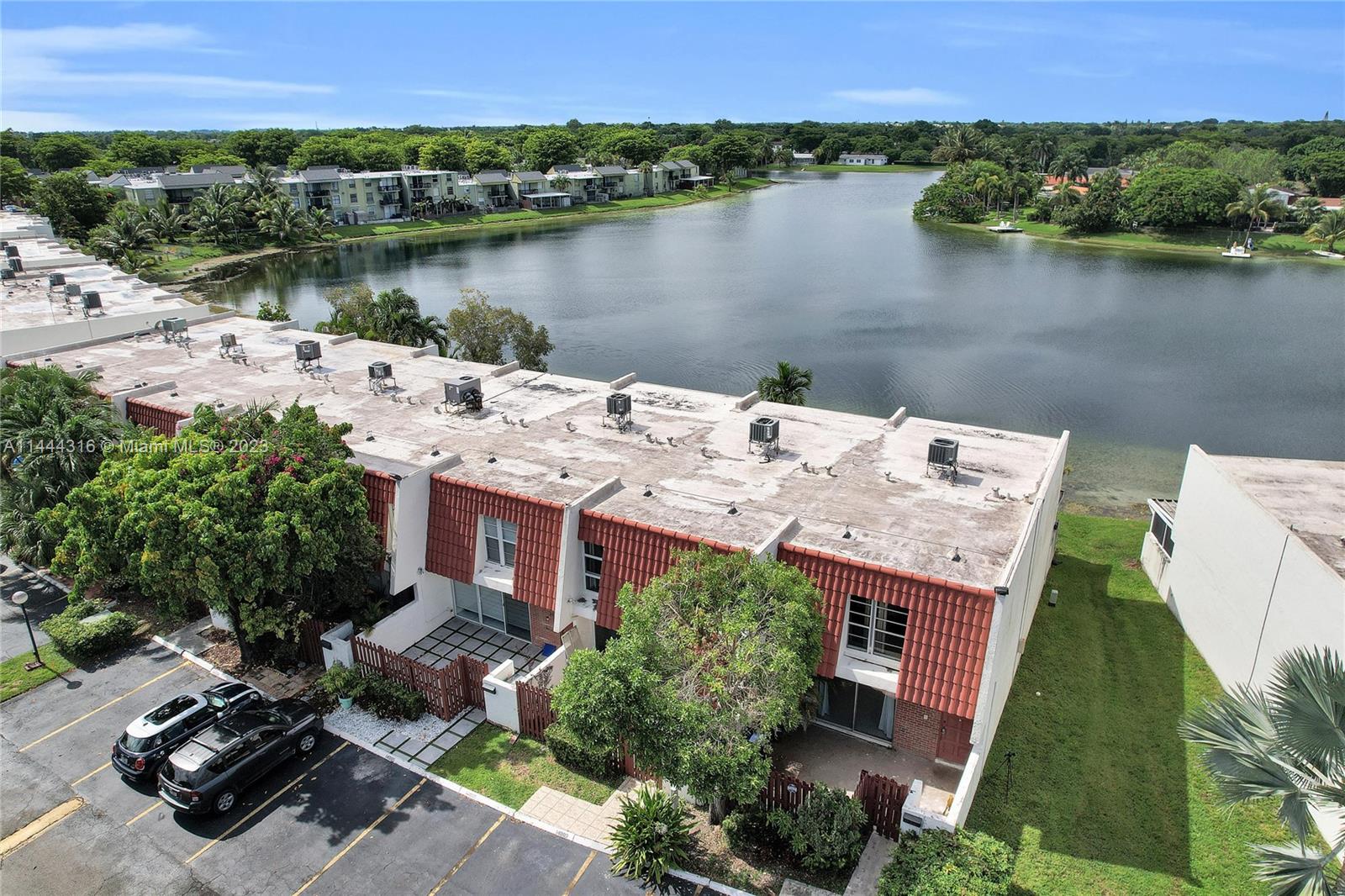 14001 Southwest 84th Street, Unit 1308 Miami, FL 33183 - Photo 33 of 47 an aerial view of a house with a lake view