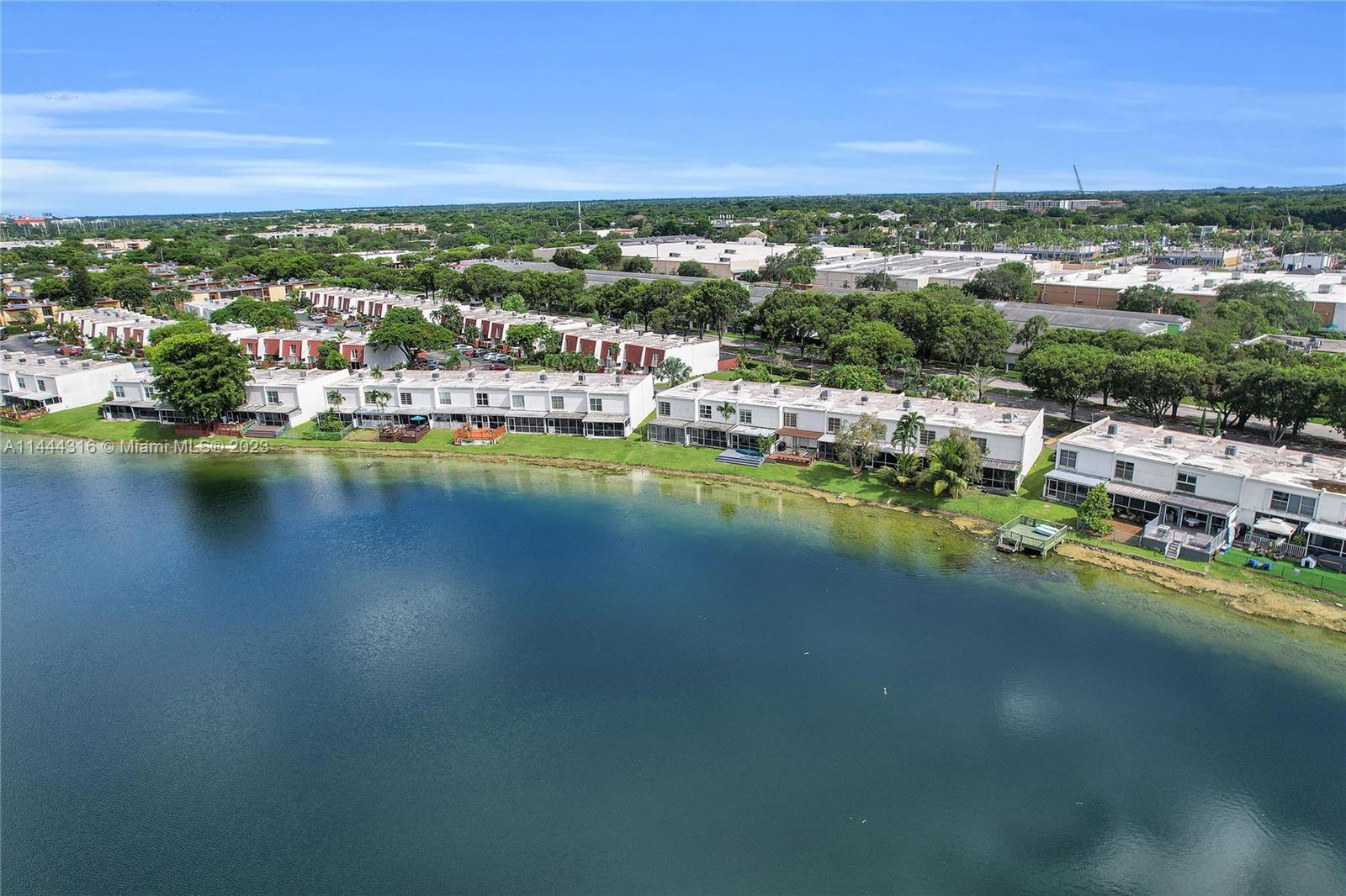 14001 Southwest 84th Street, Unit 1308 Miami, FL 33183 - Photo 37 of 47 a view of a city with lake view