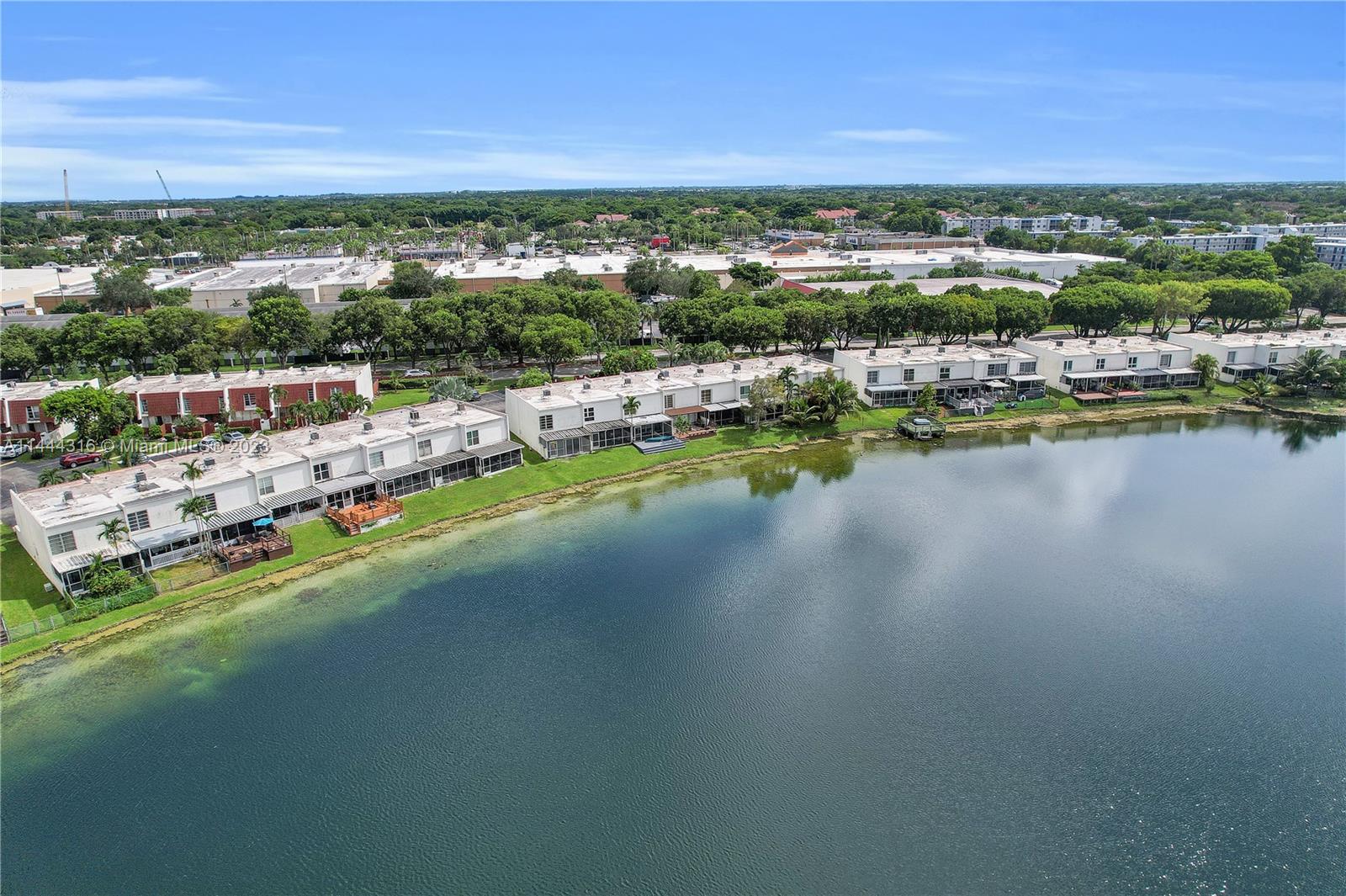 14001 Southwest 84th Street, Unit 1308 Miami, FL 33183 - Photo 43 of 47 a view of a city with swimming pool and mountains