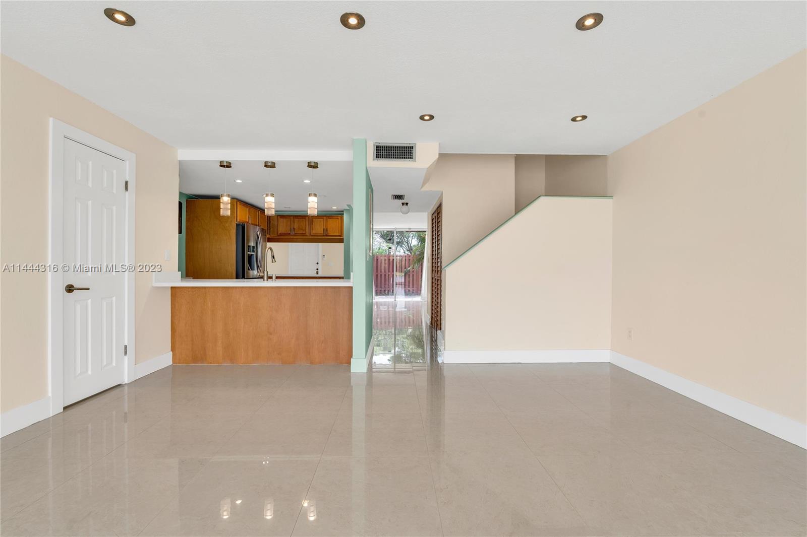 14001 Southwest 84th Street, Unit 1308 Miami, FL 33183 - Photo 10 of 47 a view of a kitchen