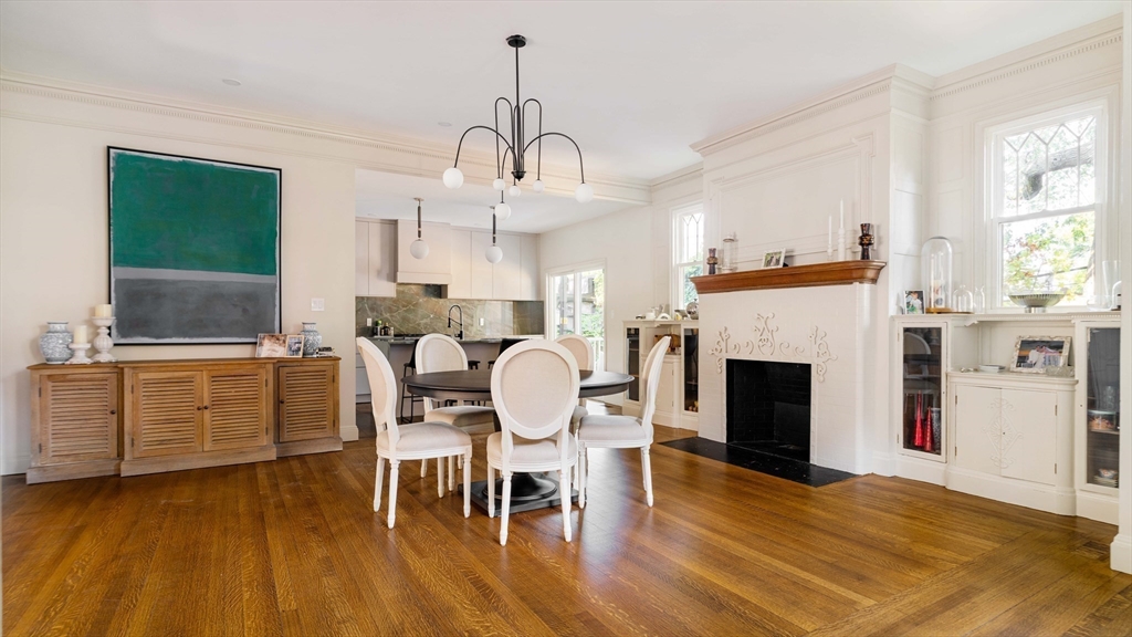 8 Naples Road, Unit 1 Brookline, MA 02446 - Photo 6 of 38 a view of a dining room with furniture window and wooden floor
