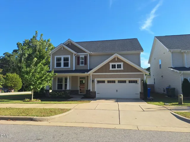 a view of a house with a swimming pool