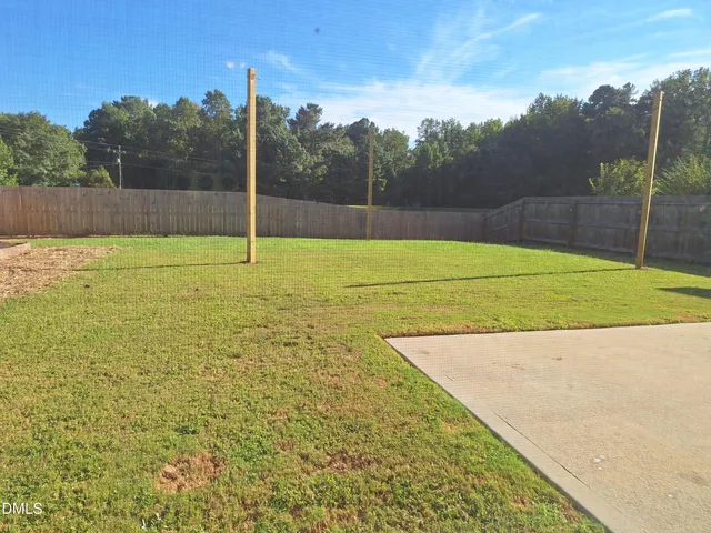 a view of an outdoor space and tennis court
