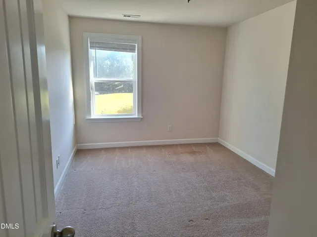 a view of empty room with window