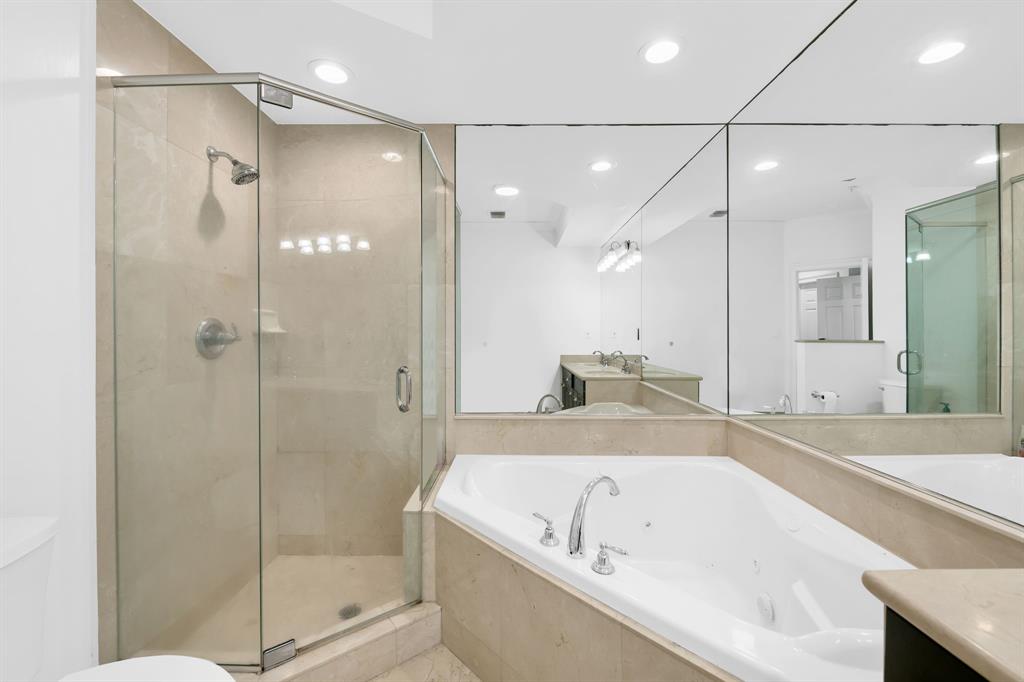 456 East Boca Raton Road Boca Raton, FL 33432 - Photo 20 of 24 a bathroom with a bathtub and a shower