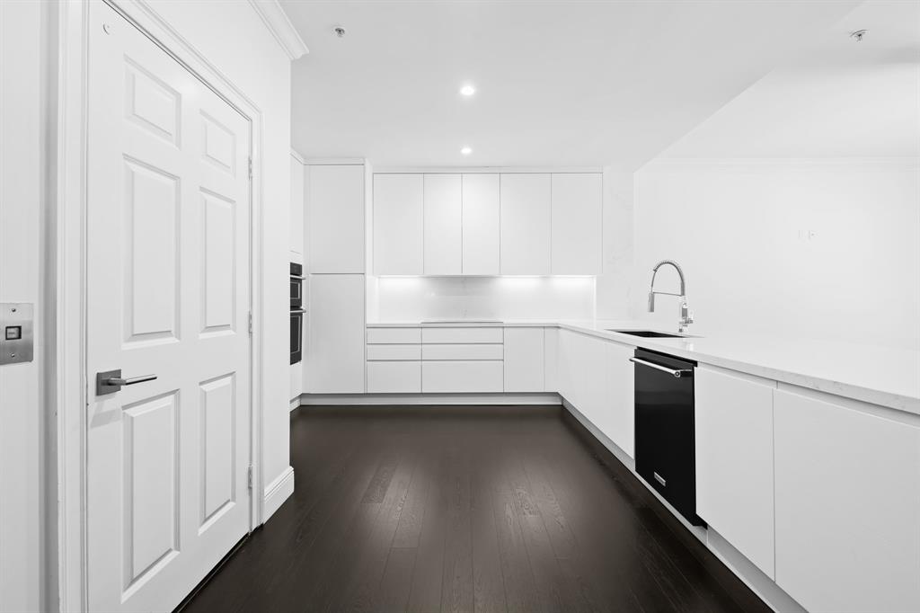 456 East Boca Raton Road Boca Raton, FL 33432 - Photo 9 of 24 a kitchen with a refrigerator and a sink