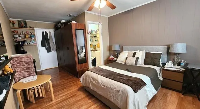 a bed room with a bed and a couch