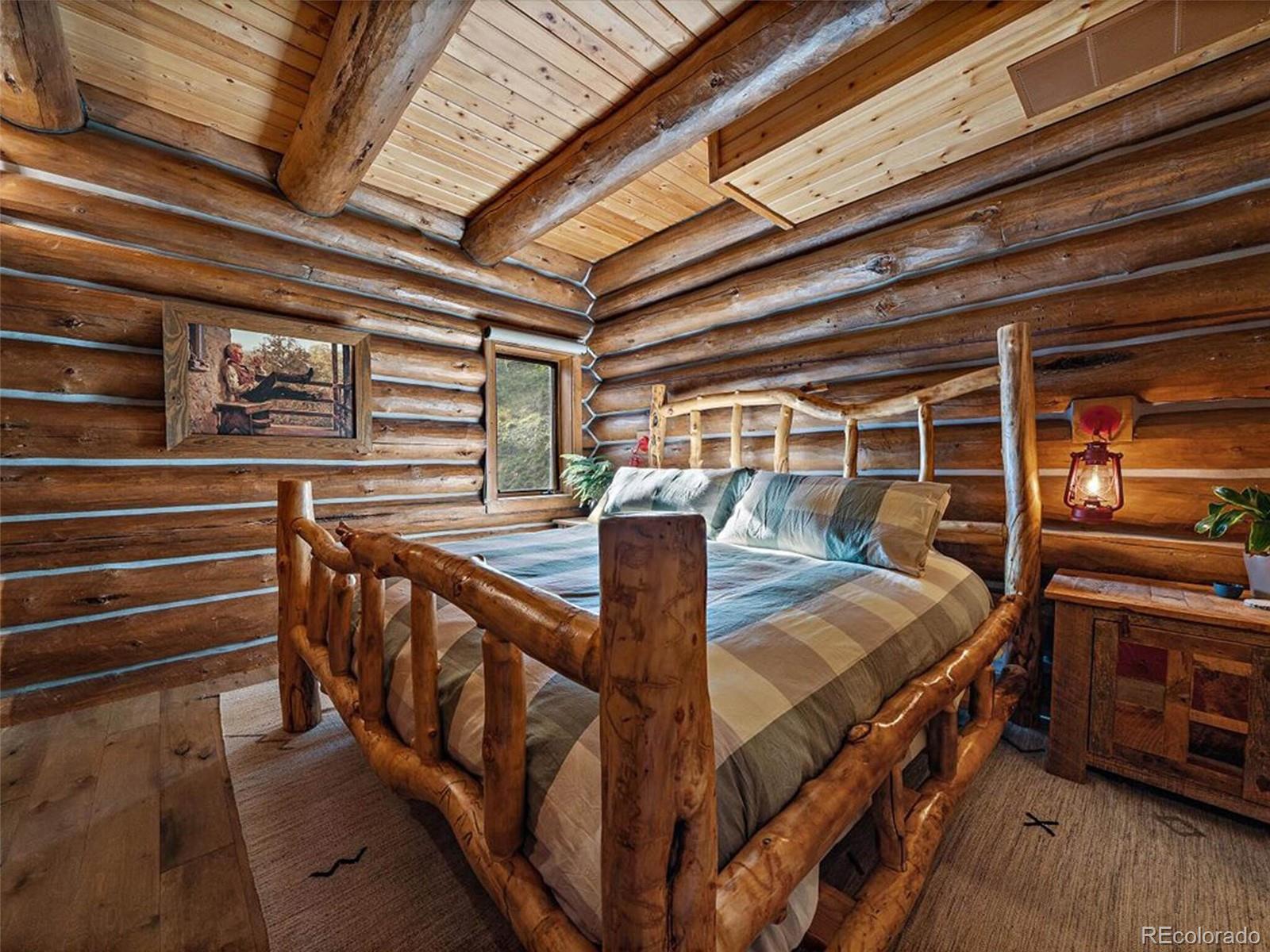 3602 Riverside Drive Lyons, CO 80540 - Photo 14 of 40 a view of an empty room with wooden floor