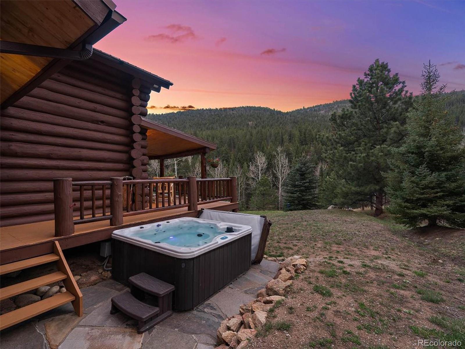 3602 Riverside Drive Lyons, CO 80540 - Photo 30 of 40 a view of a backyard with sitting area