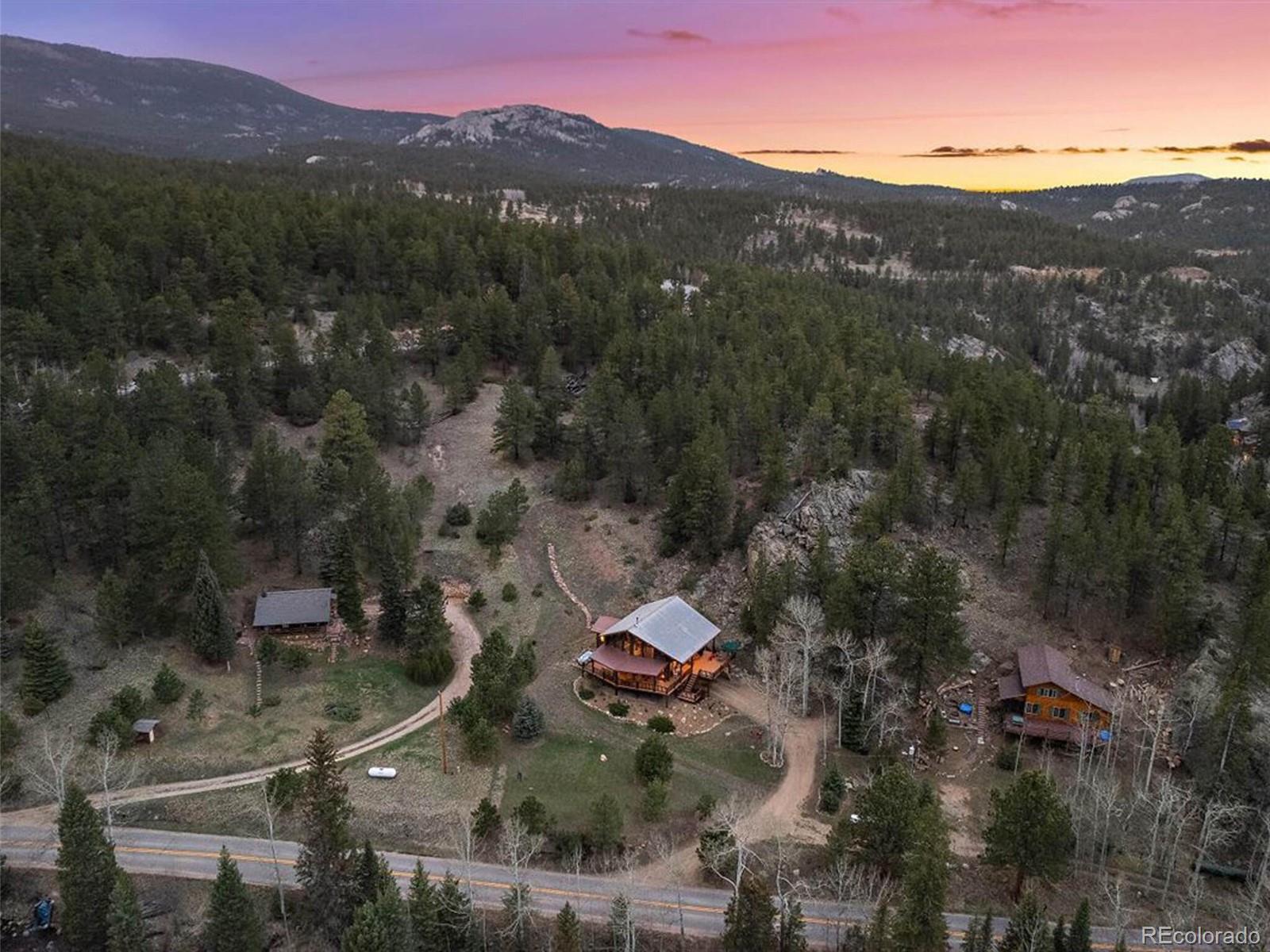 3602 Riverside Drive Lyons, CO 80540 - Photo 3 of 40 an aerial view of residential houses with outdoor space and river