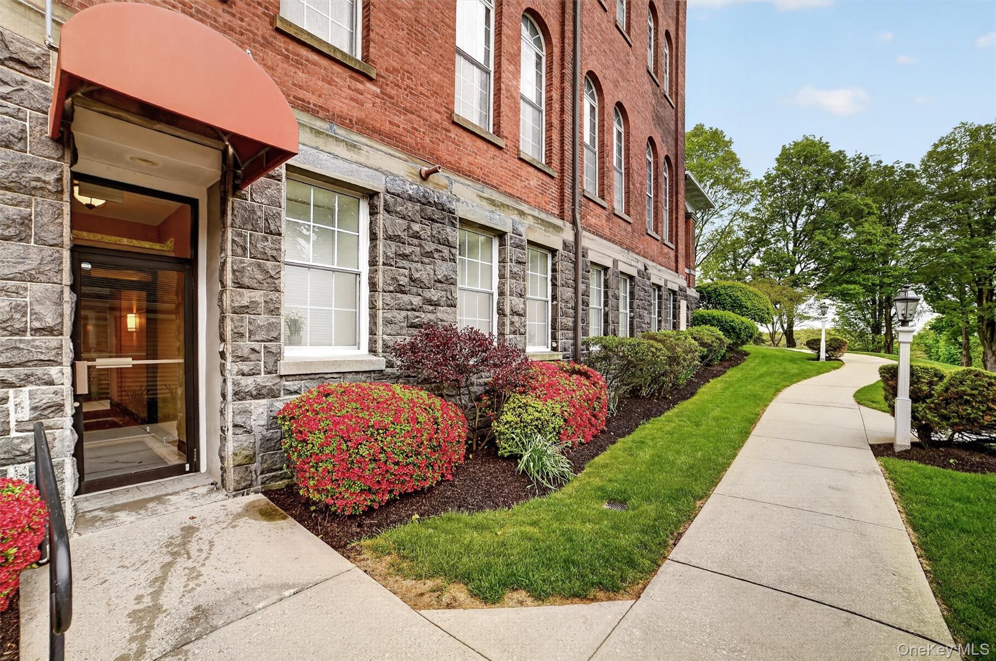 200 School House Road, Unit 1A Peekskill, NY 10566 - Photo 2 of 35 No step entrance behind garages