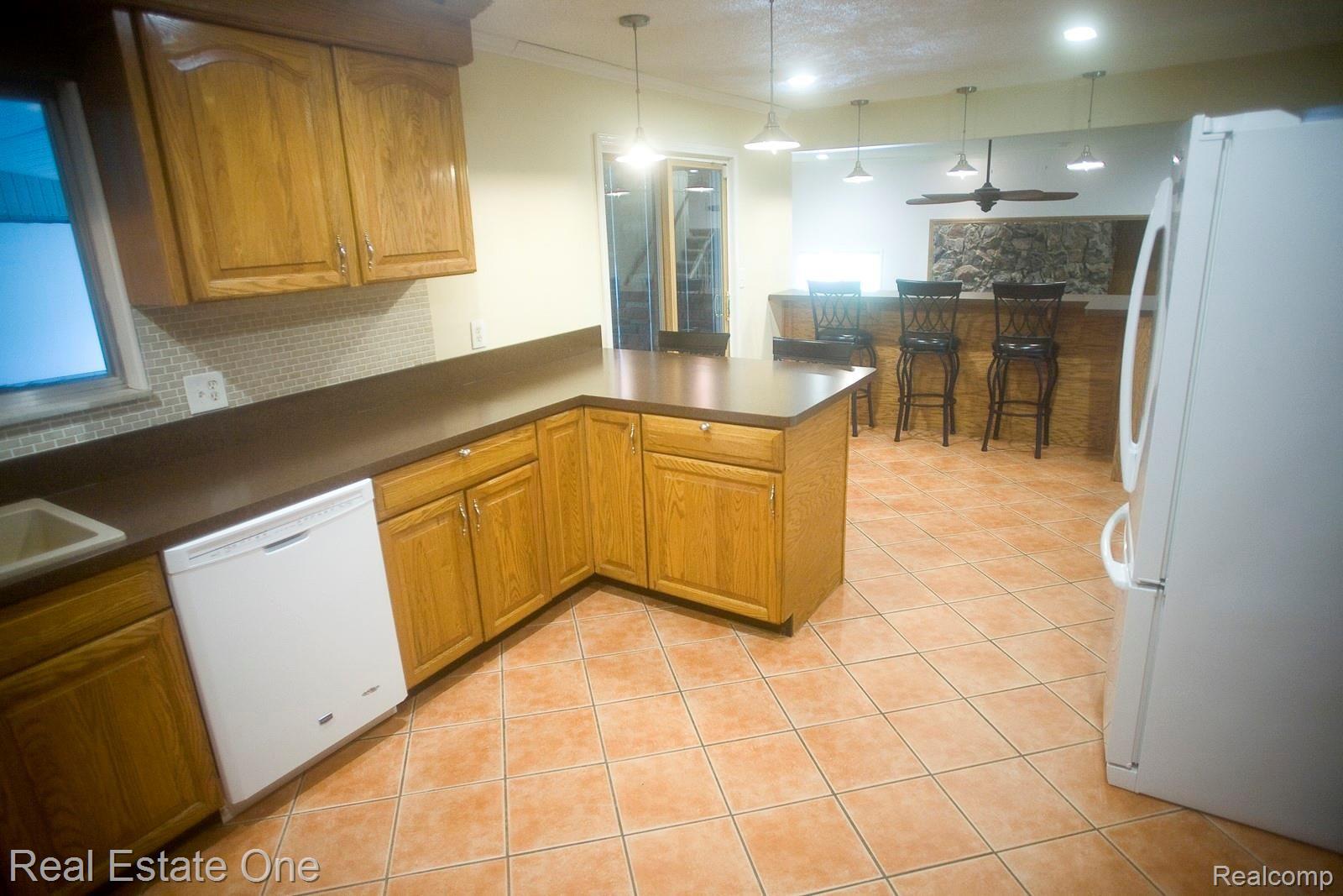 42560 Willis Road Belleville, MI 48111 - Photo 12 of 70 KITCHEN HAS LOTS OF COUNTERSPACE.