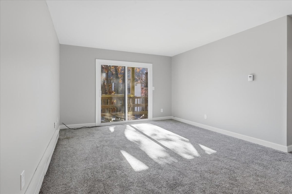 800 Bearses Way, Unit 2SB Barnstable, MA 02601 - Photo 26 of 40 a view of an empty room with a window