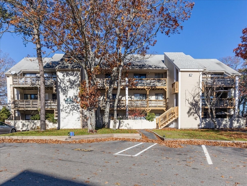 800 Bearses Way, Unit 2SB Barnstable, MA 02601 - Photo 4 of 40 a view of a building with a street