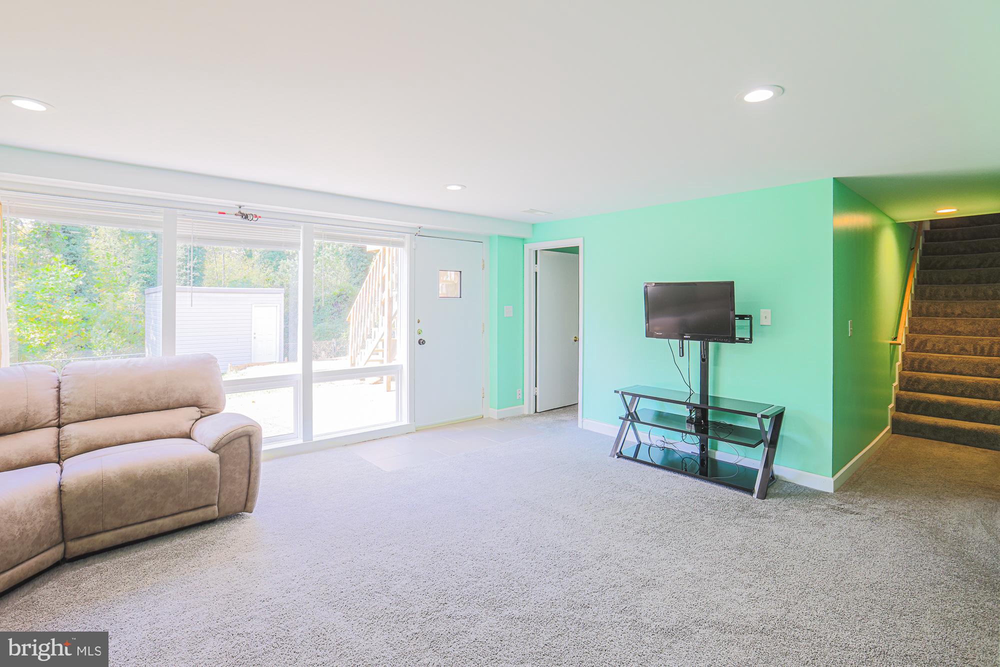 416 Nottingham Road Baltimore, MD 21229 - Photo 24 of 39 a living room with furniture and a window