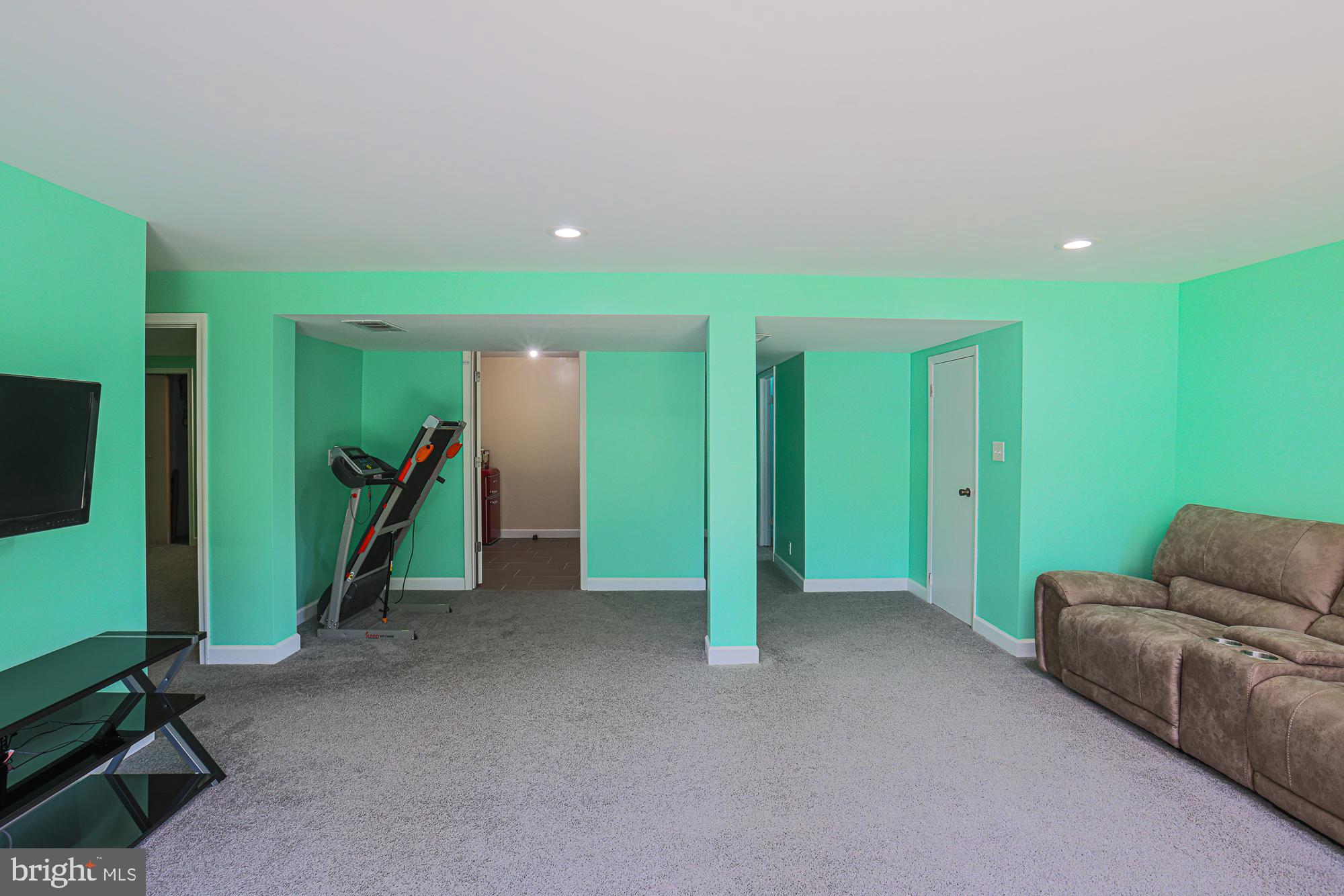 416 Nottingham Road Baltimore, MD 21229 - Photo 25 of 39 a view of an empty room with furniture and a window