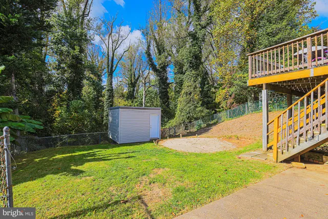 a view of a backyard with a deck