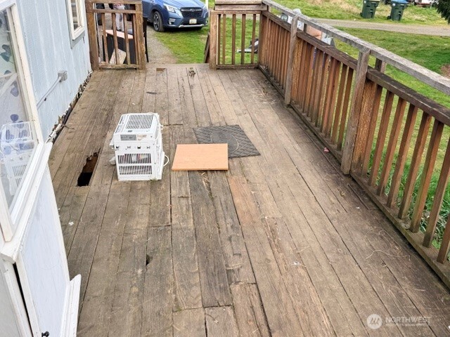 1017 C Street Vader, WA 98593 - Photo 13 of 16 a view of outdoor space with deck and yard