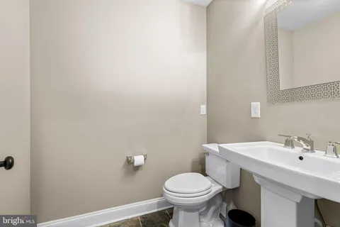 a bathroom with a sink and a toilet