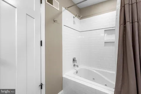 a bathroom with a bathtub