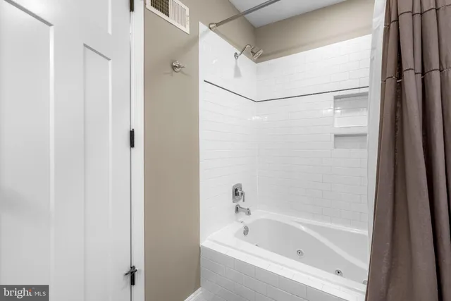 a bathroom with a bathtub