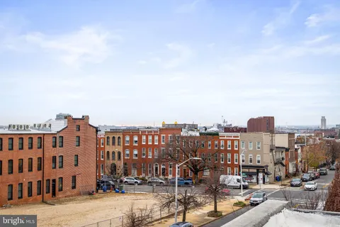 a view of a city with tall buildings
