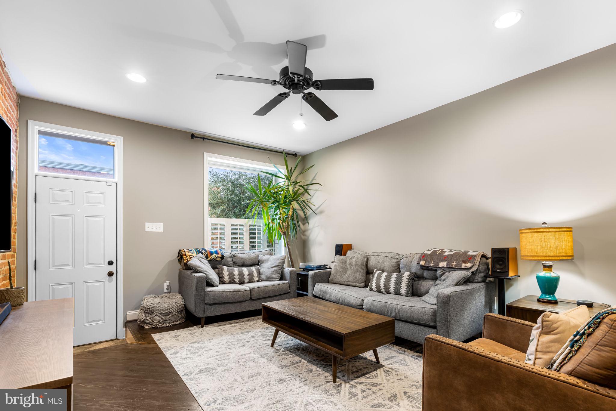 3116 Hudson Street Baltimore, MD 21224 - Photo 4 of 39 a living room with furniture and a large window