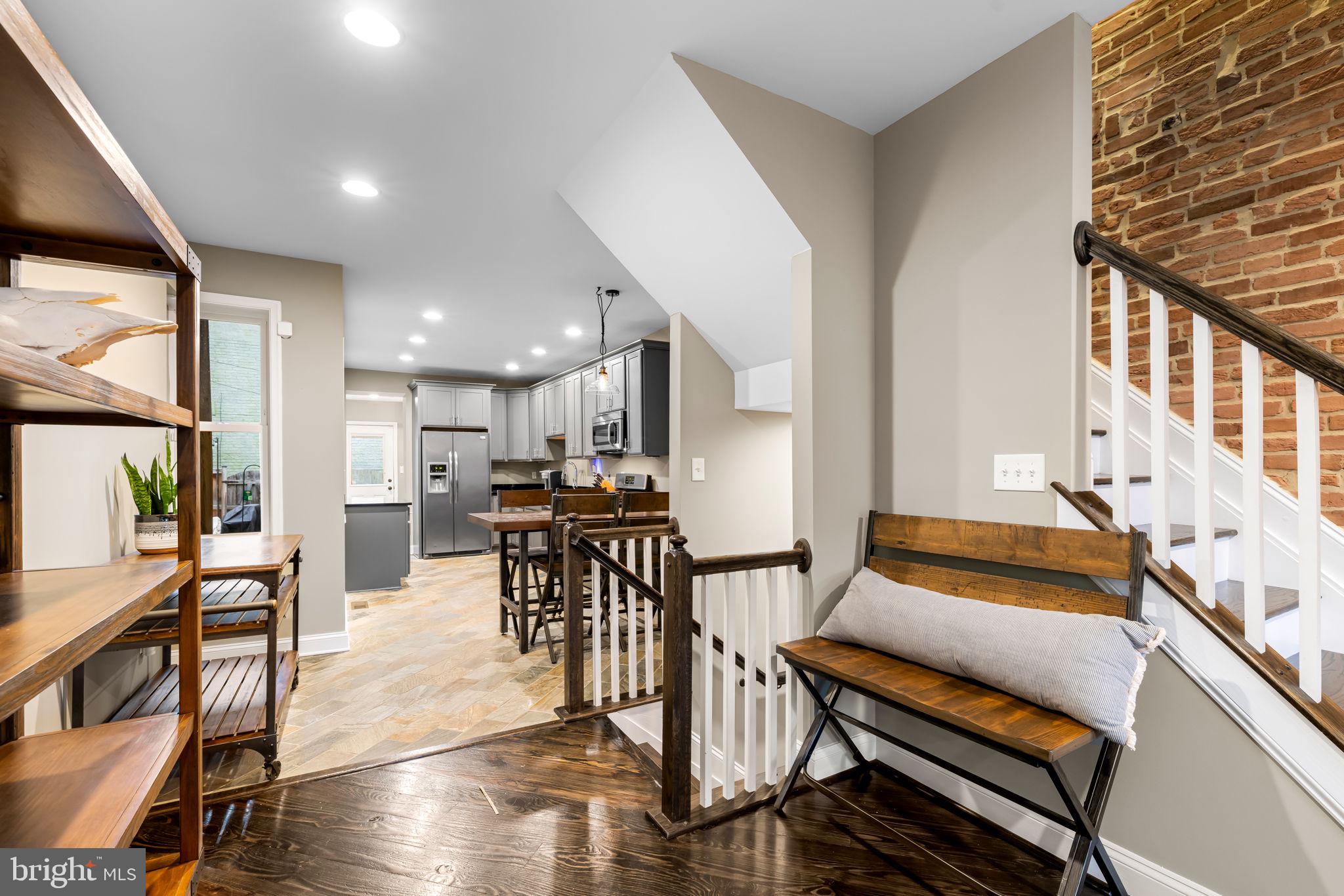 3116 Hudson Street Baltimore, MD 21224 - Photo 7 of 39 a view of a dining room with furniture window and wooden floor